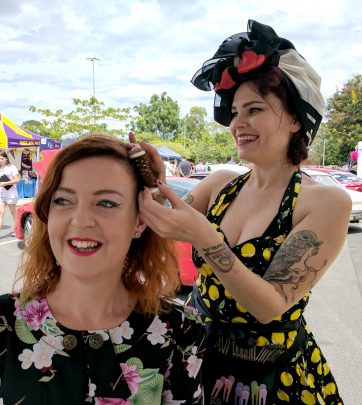 Tash Farrar works on styling Crystal Brady's hair.