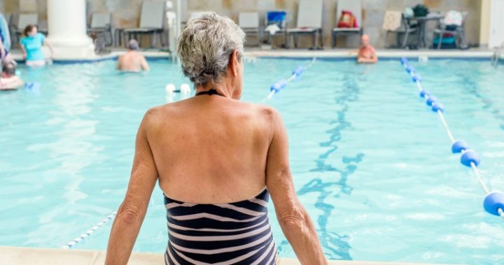 Margaret has her choice of swimming indoors or outdoors, with two pools at the lifestyle village. Source: Getty (Photograph posed by model)