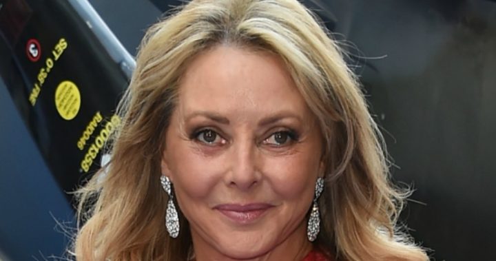 calvin klein royal blue ruffle dress Sunday Times Magazine Sept 8 2024: Carol Vorderman main image 1