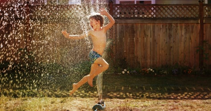 We'd keep cool by getting outside and playing under the sprinkler. Source: Pixabay