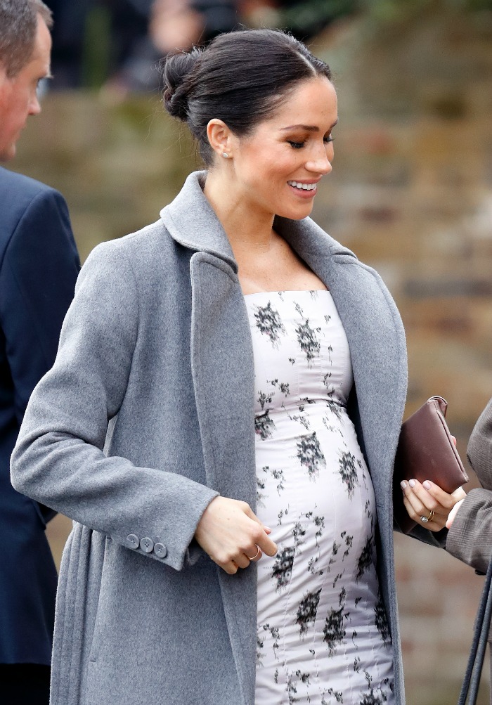 Fans were quick to comment on Meghan's growing bump. Source: Getty.