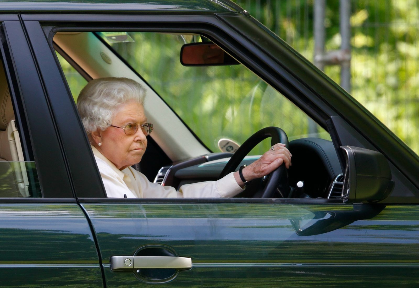 The Queen is often spotted driving herself around. Source: Getty.