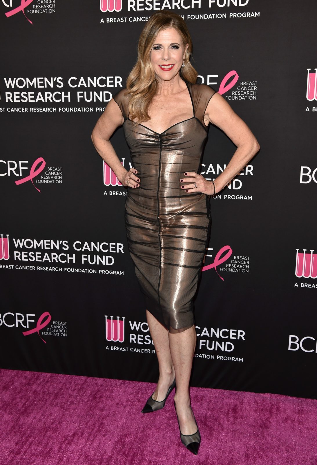 Rita Wilson put on a striking display in a fitted metallic dress. Source: Getty