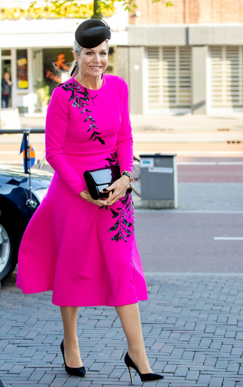 Queen Maxima was all smiles as stepped out in a colourful dress for an engagement in Utrecht on Thursday. Source: Getty