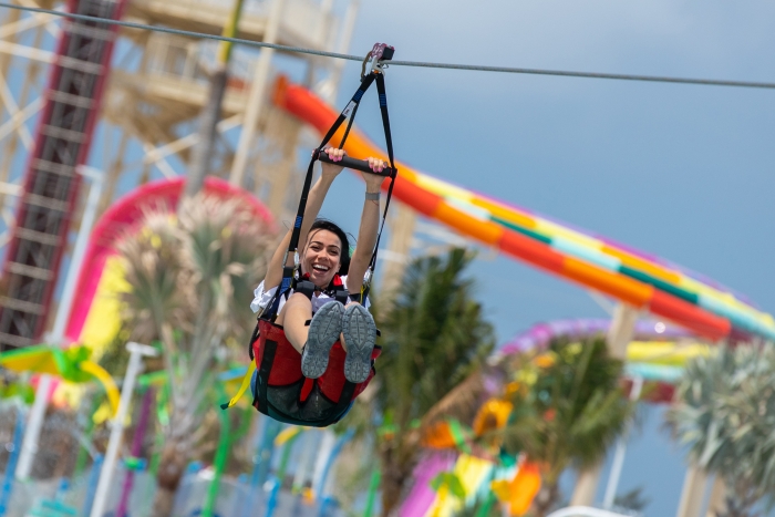 Soar on the 488-metre-long zip-line course that crosses the island. Source: Royal Caribbean