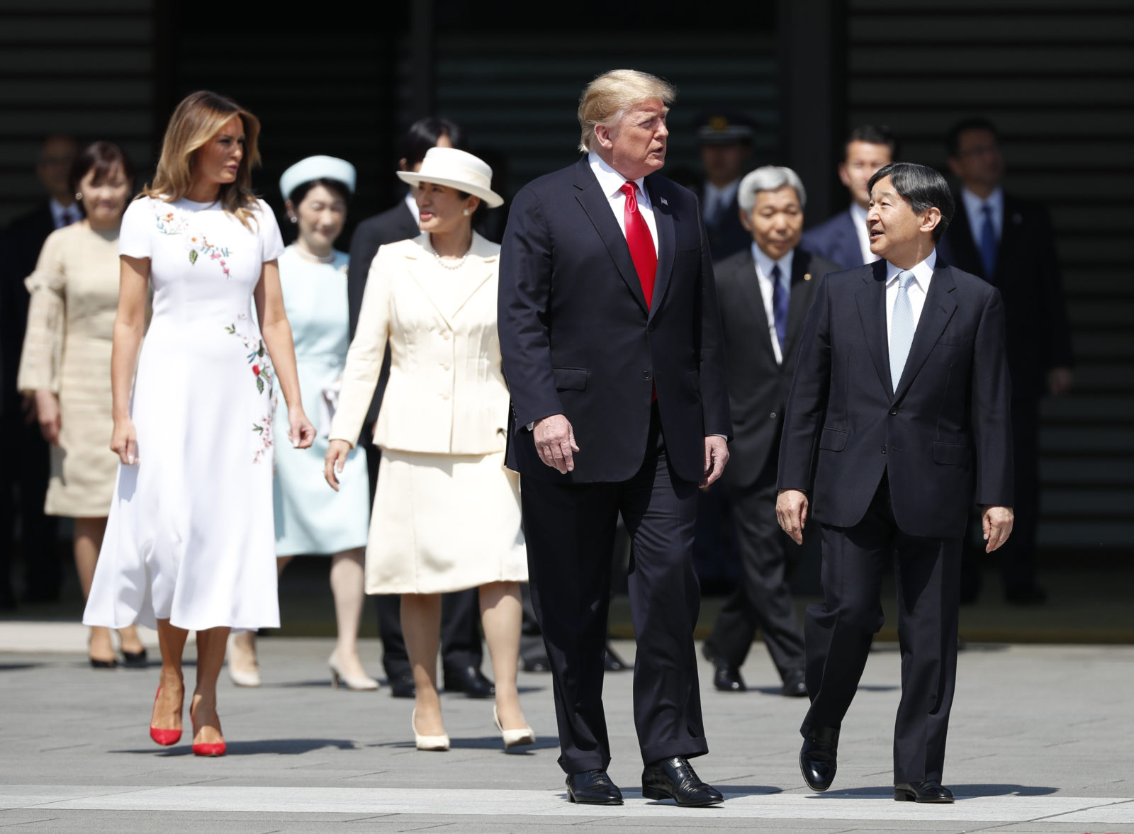 First Lady Melania Trump looked beautiful in a pretty white frock alongside president husband Donald Trump during a meeting with Japan's Emperor Naruhito and Empress Masako at a welcome ceremony at the Imperial Palace in Tokyo.