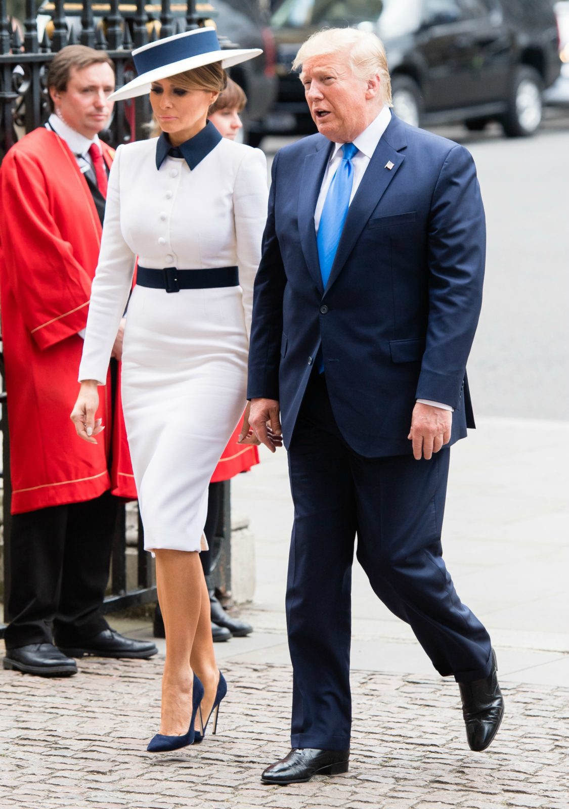 Melania has channeled the late Princess Diana in a retro white ensemble as she arrived at Buckingham Palace on Monday afternoon alongside her husband Donald Trump. Source: Getty