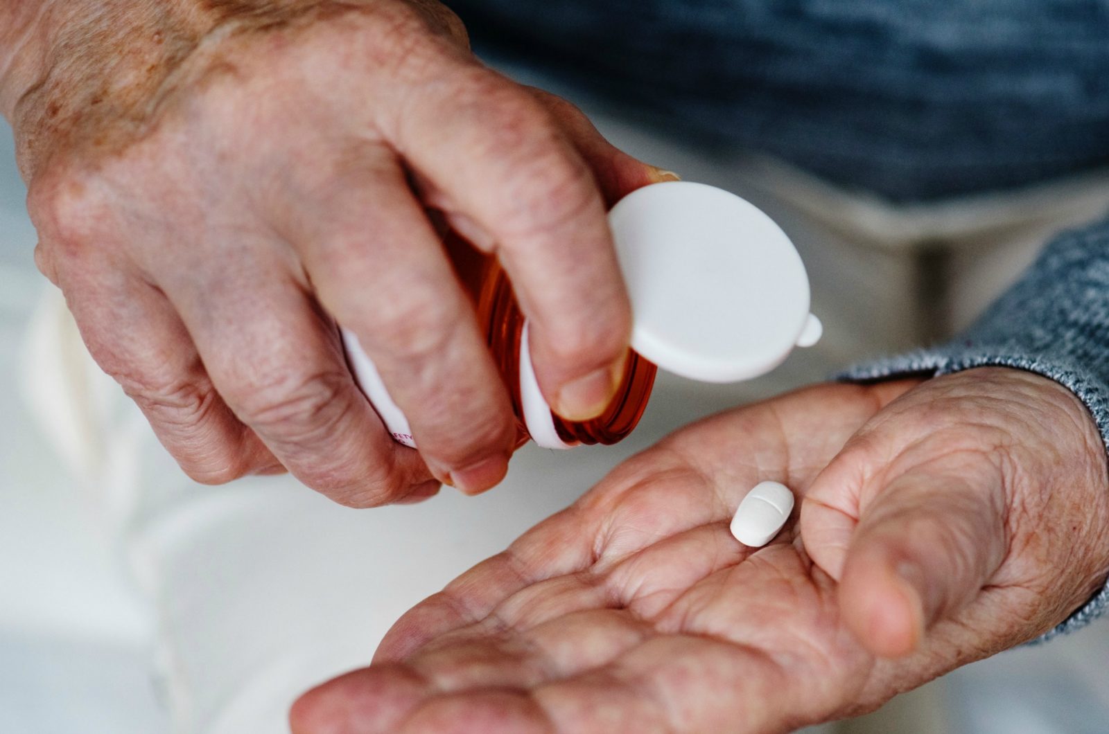 man using medication to treat incontinence