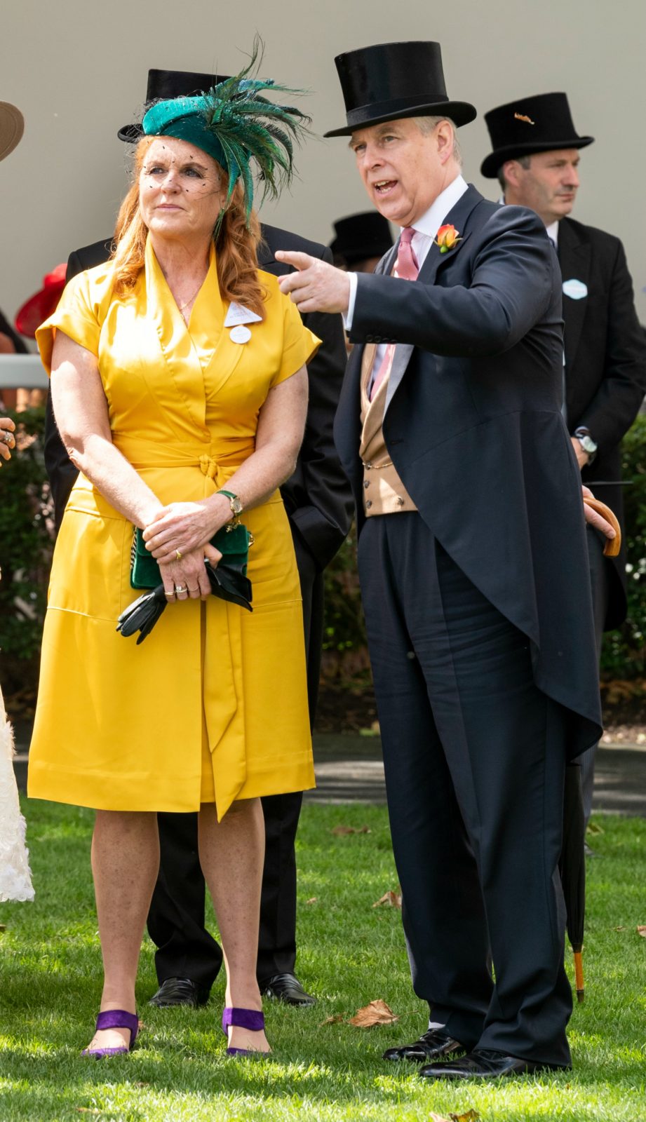 Fergie stood out in canary yellow alongside her ex husband. Source: Getty.