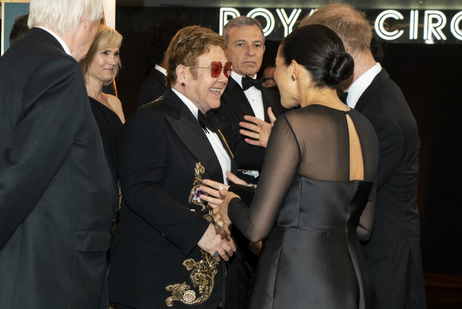 Meghan and Prince Harry caught up with Elton John on the red carpet of the Lion King premiere. 