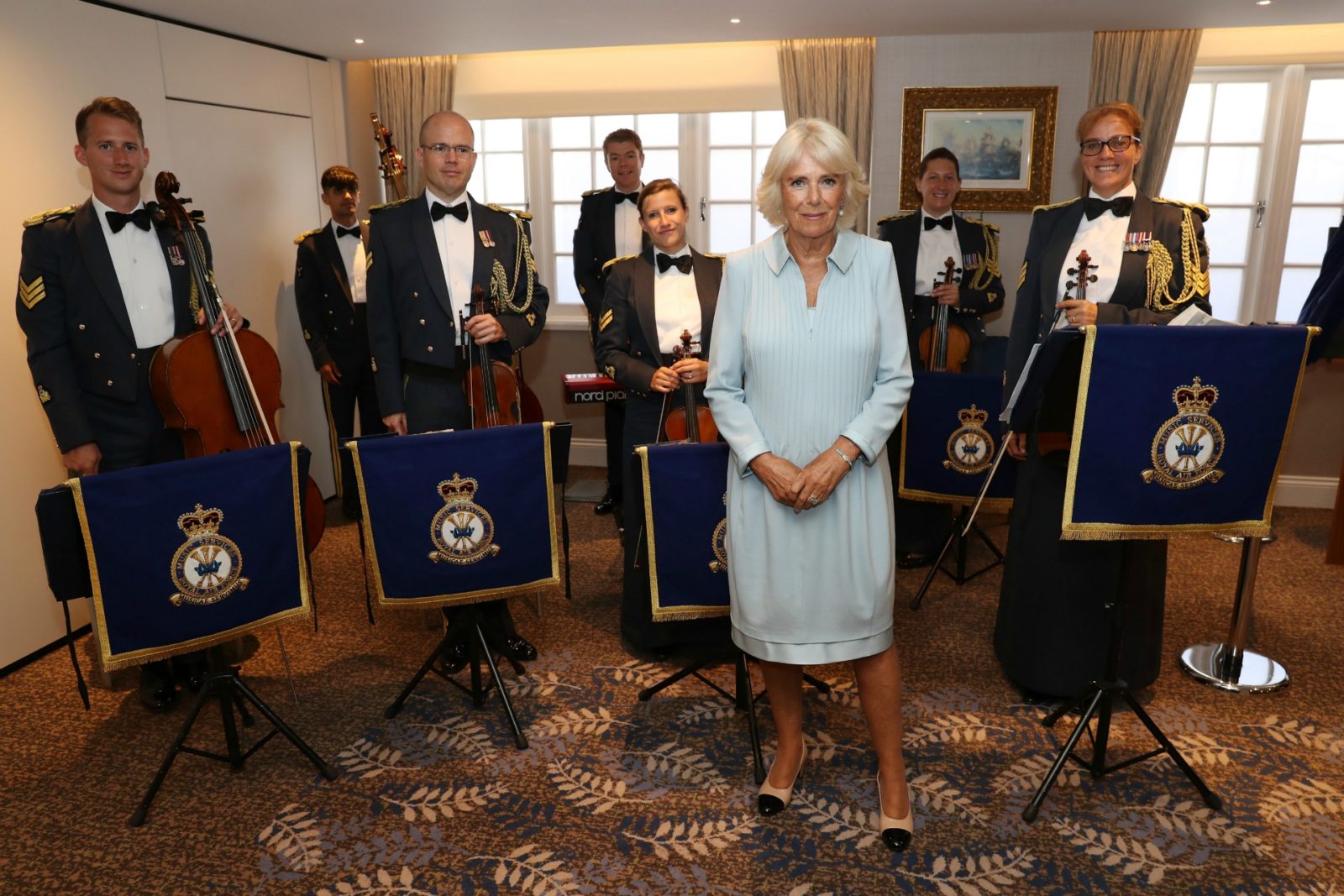 Camilla wearing pastels