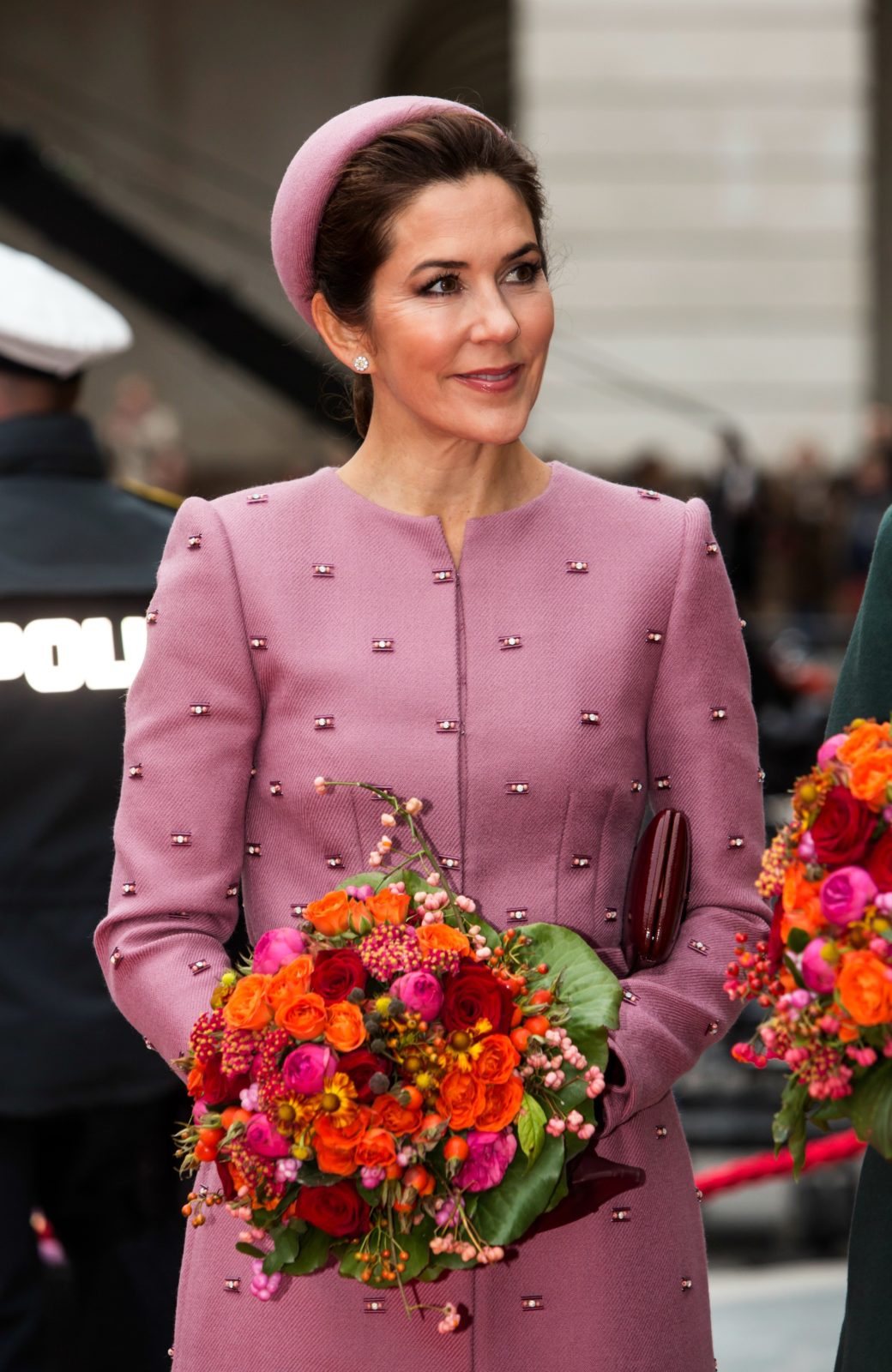 Princess Mary stood out in the dusty pink coat dress and pillbox hat to open Parliament. Source: Getty.