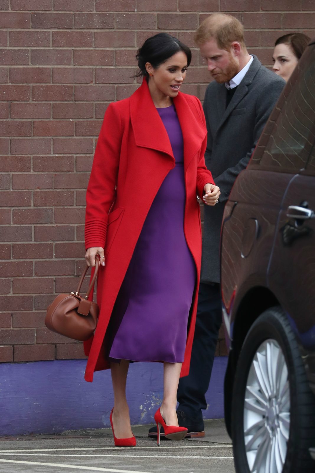 Meghan previously wore the purple dress in January while pregnant with Archie. Source: Getty.
