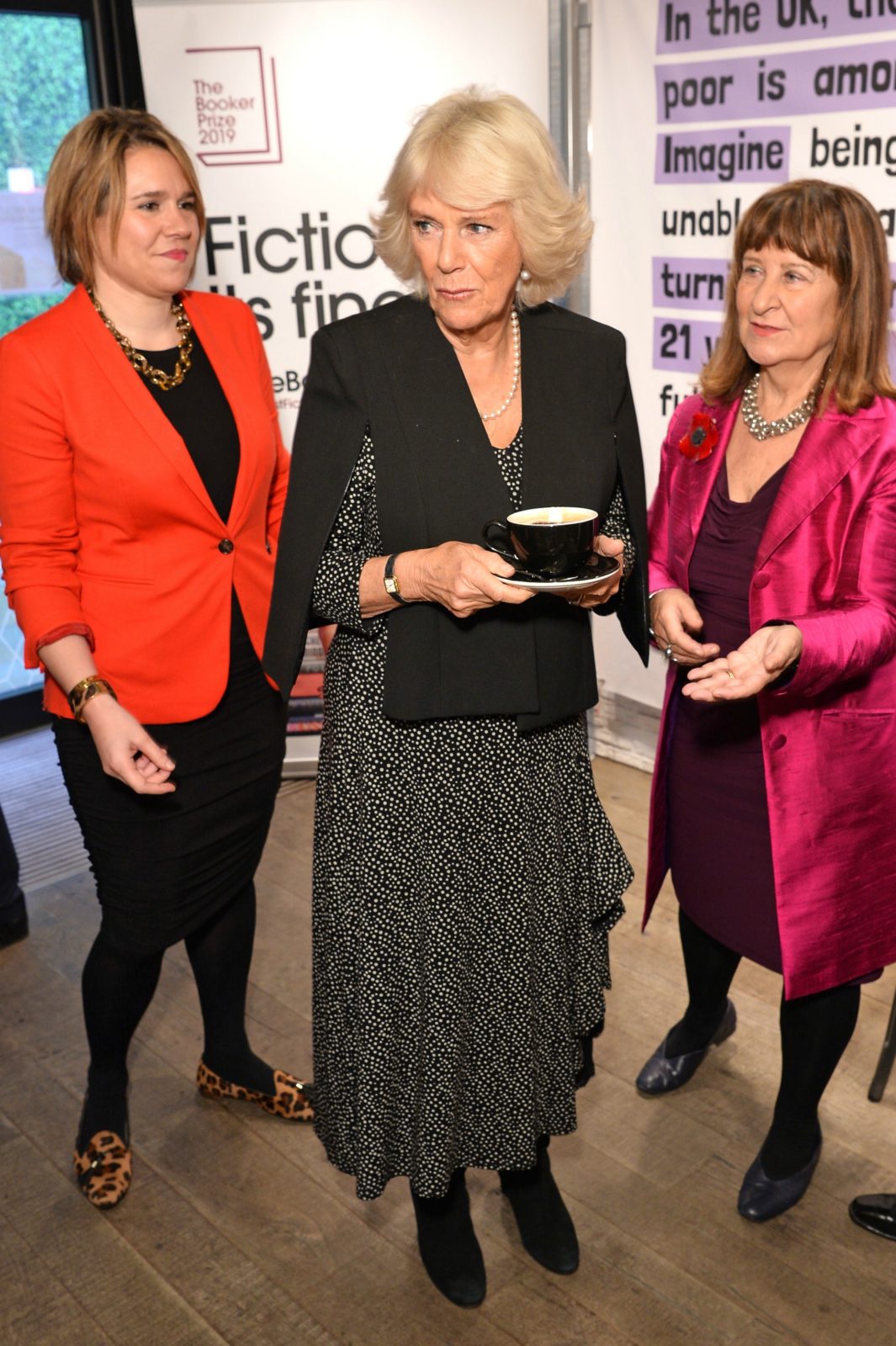 Camilla debuted a modern cape-style jacket over her traditional polka dot dress. Source: Getty.