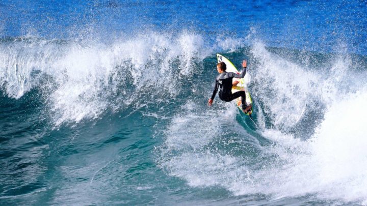 Surfer at Lennox Head, NSW