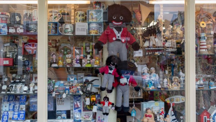 Jennifer makes and sells golliwog dolls, like the ones in this shop window, and says they are much loved children's toys. Source: Getty Images