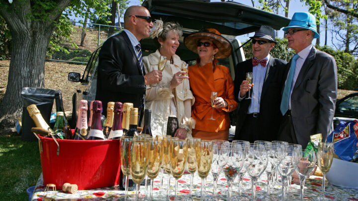 Racegoers enjoying a champagne breakfast in the members' carpark during the 2009 Melbourne Cup Day, at Flemington Racecourse. Source: Getty 