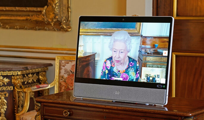 LONDON, ENGLAND - OCTOBER 28: Queen Elizabeth II appears on a screen via videolink from Windsor Castle, where she is in residence, during a virtual audience to receive David Constantine and present him with The Queen's Gold Medal for Poetry, at Buckingham Palace, on October 28, 2021 in London, England.  (Photo by Kirsty O'Connor - Pool/Getty Images)