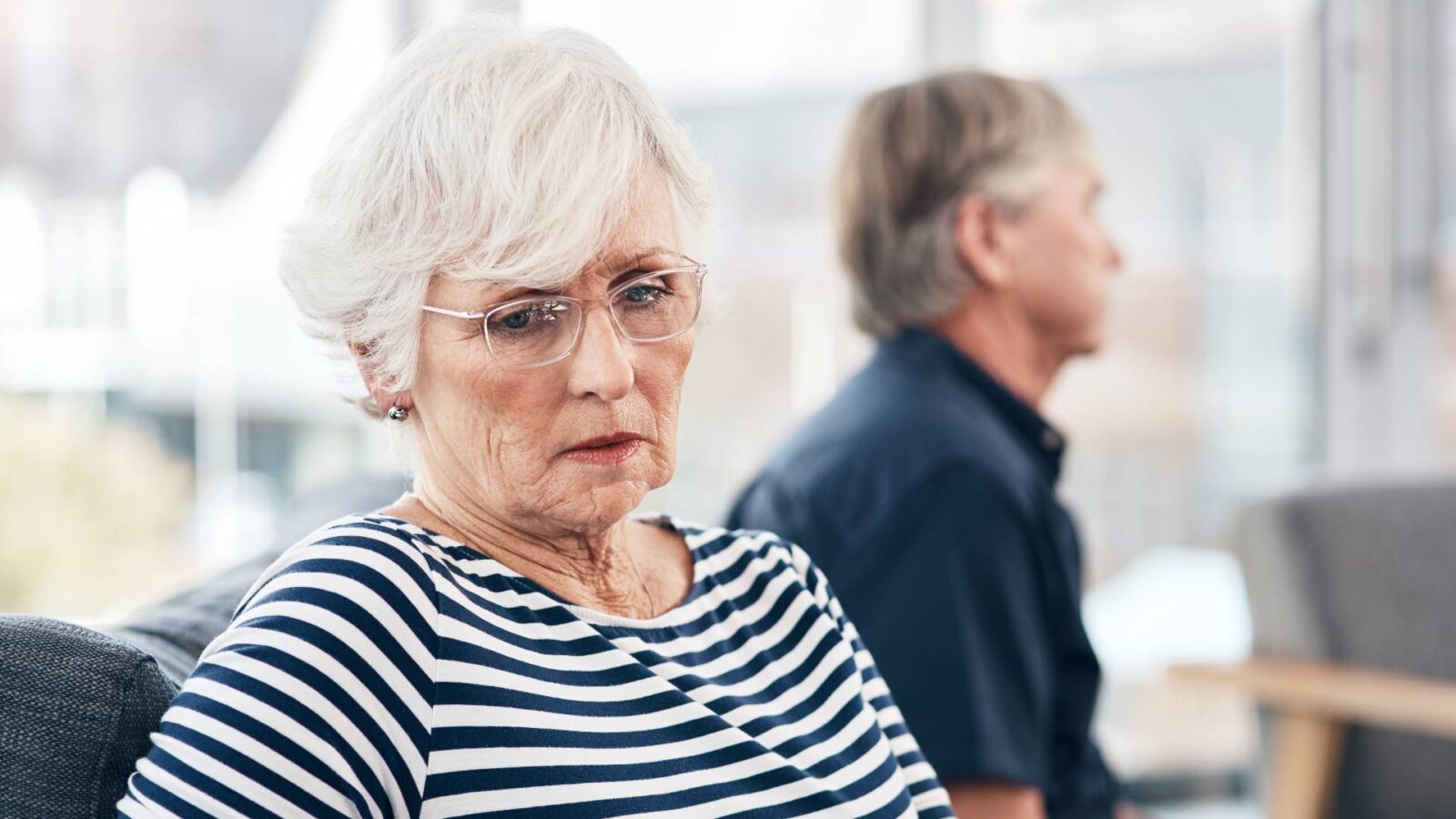 unhappy older couple