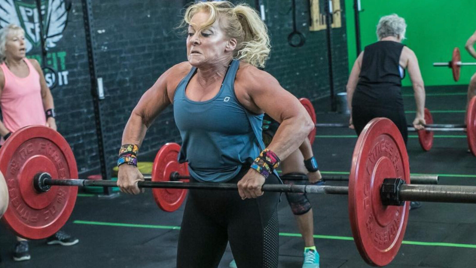 Powerlifting grandma is setting records and beating women half her