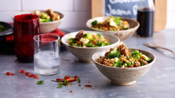 Cafe-style fried rice with egg, peas and sausage - Starts at 60