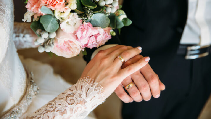 A soon-to-be groom has chosen to adopt his fiancée's surname after their wedding, a decision that has left his family questioning traditional norms and pondering, "Is this normal?" Source: Getty Images. 