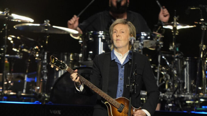 Paul McCartney takes crowds on a nostalgic journey through his legendary career, reuniting with a virtual John Lennon for an unforgettable encore. Source: AP PHOTO.